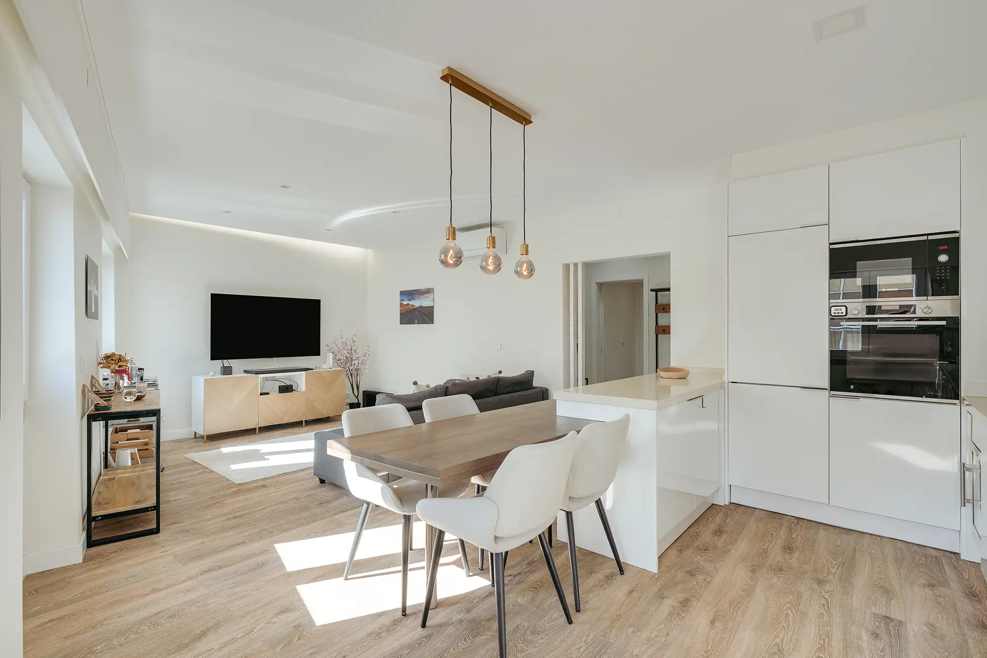 Open-plan kitchen and living room in a Host Wise Lisbon apartment